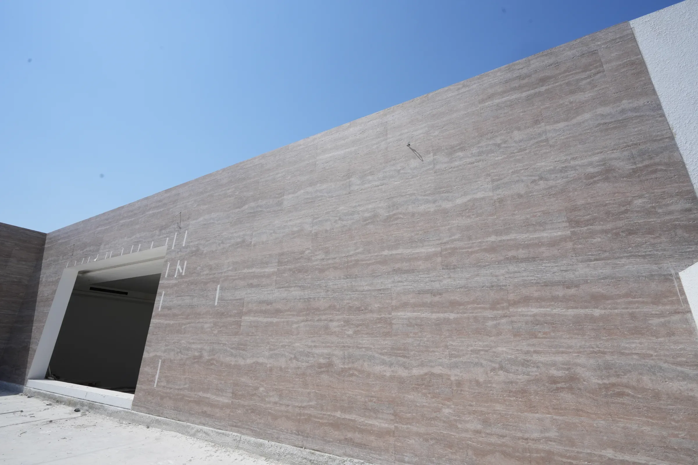 Large coral travertine wall