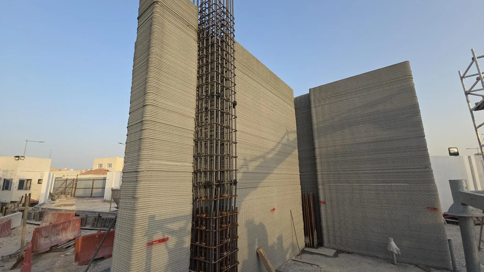 Two printed walls with a rebar cage between them