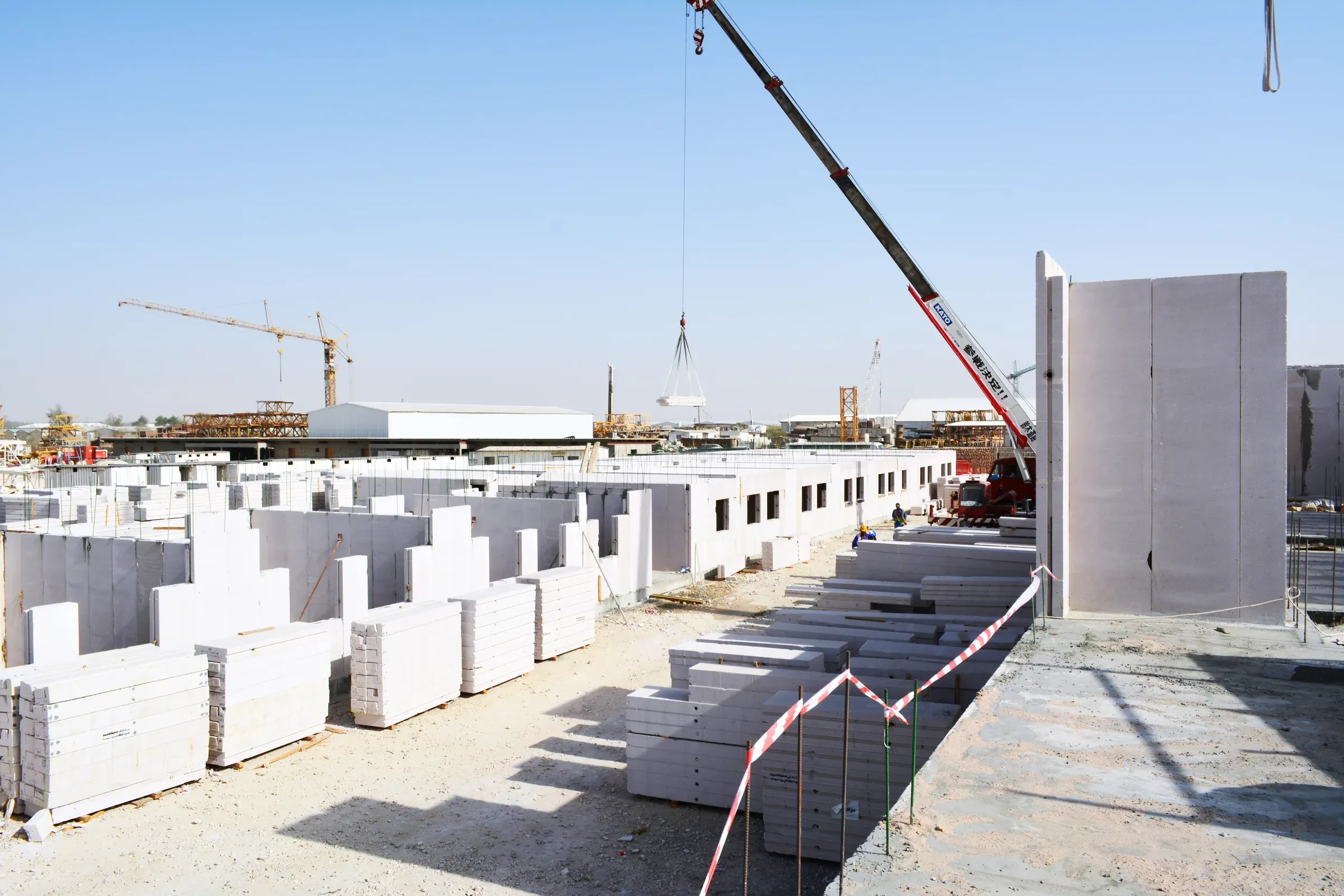 AAC panel lifted by crane on site